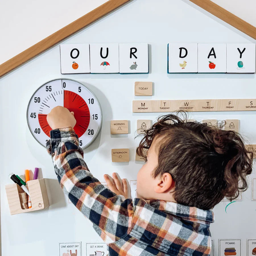 child with routine cards